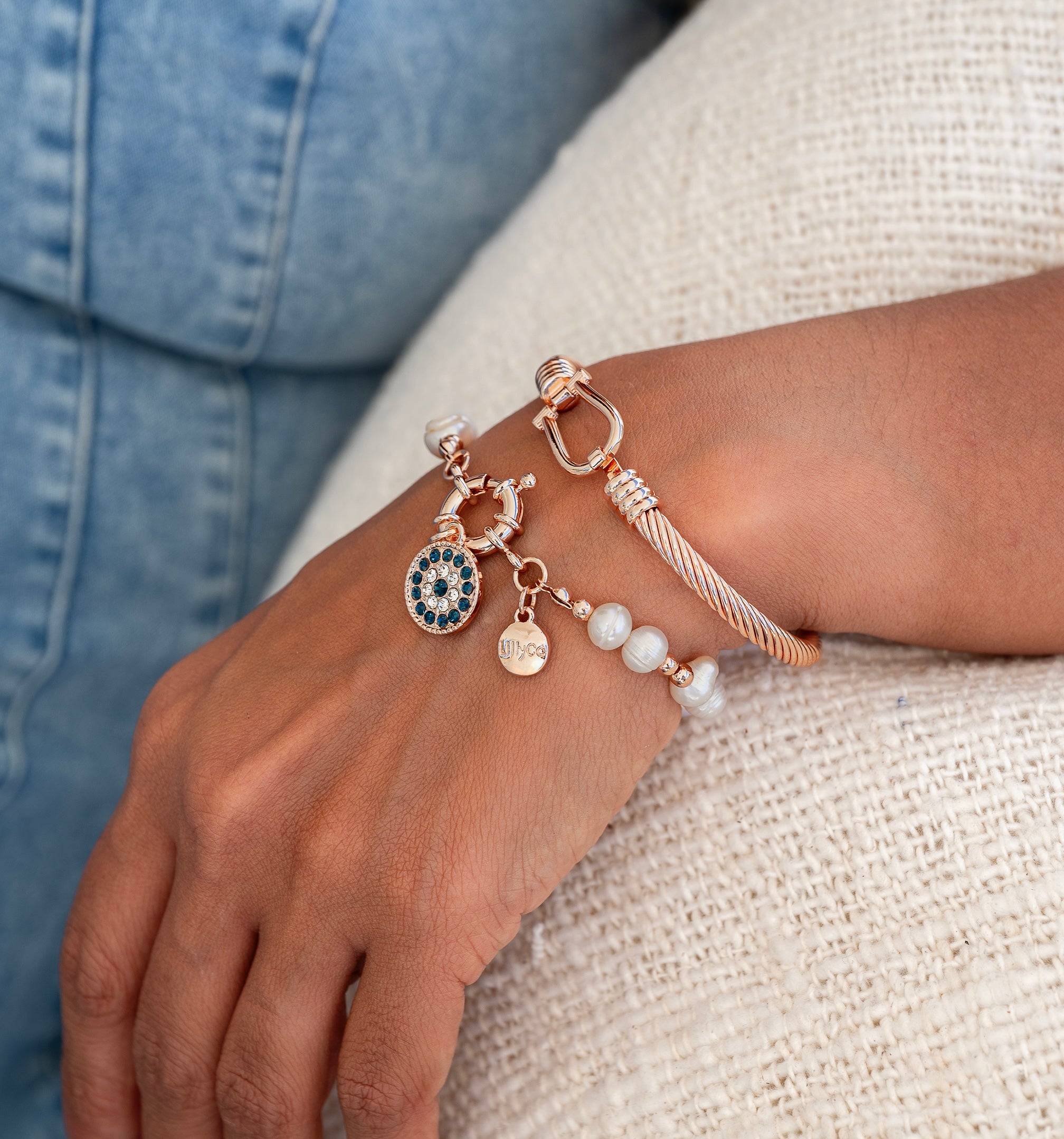 Rose Gold Eye Pendant on Freshwater Pearl Bracelet