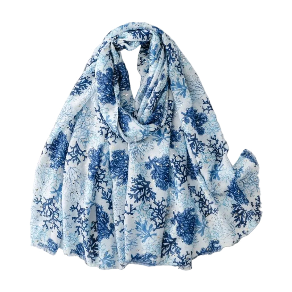 Blue and white floral patterned scarf on a light gray background