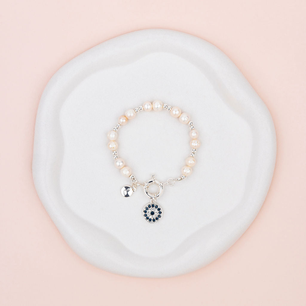 Silver Eye Pendant on Freshwater Pearl Bracelet