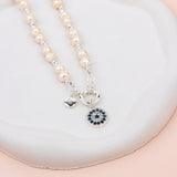 SHORT |Silver Eye Pendant on Freshwater Pearl Necklace
