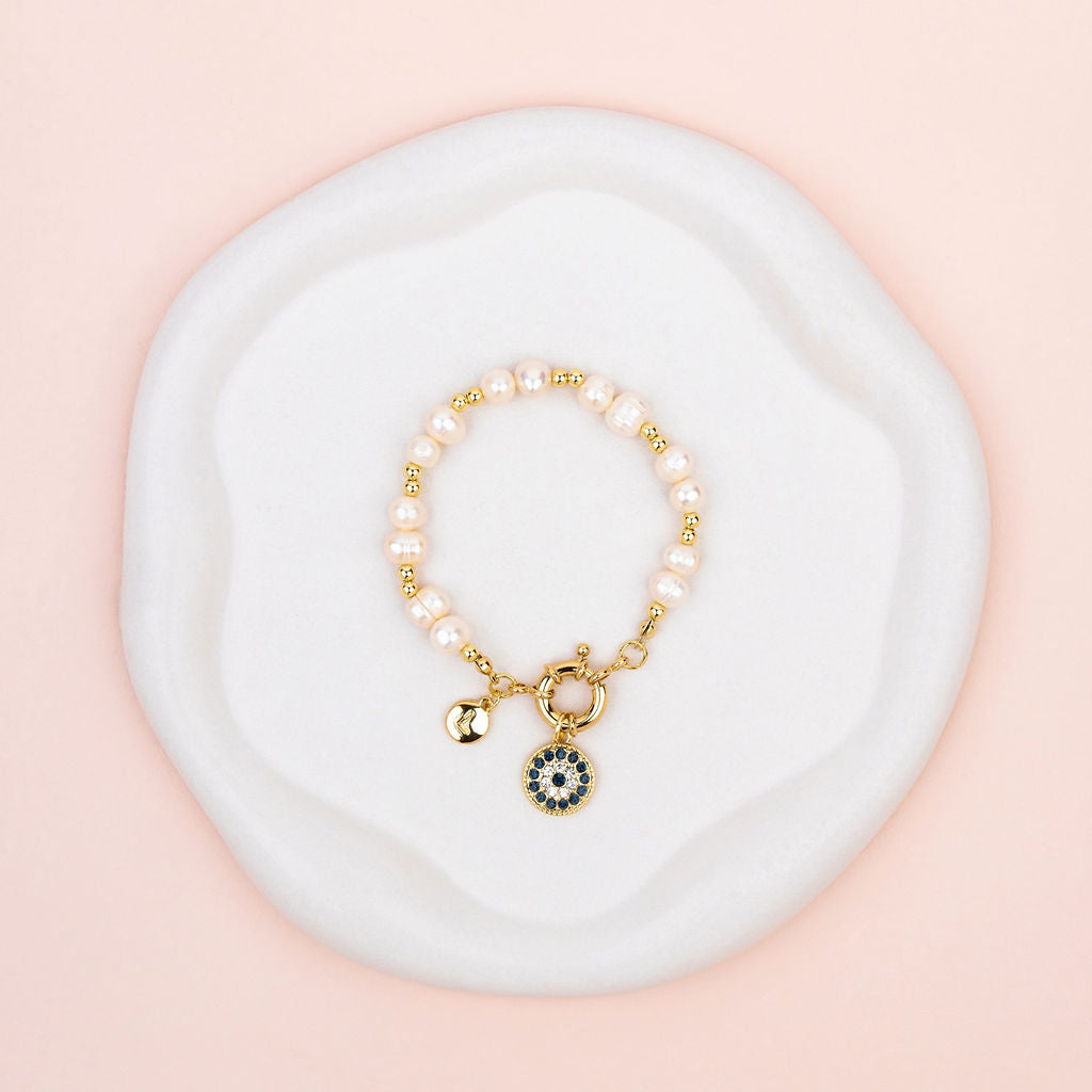 Yellow Gold Eye Pendant on Freshwater Pearl Bracelet