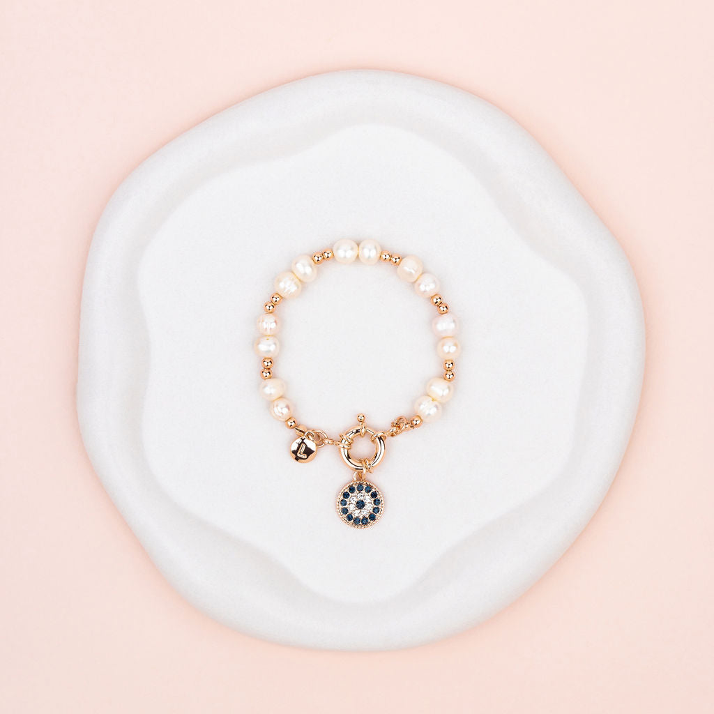 Rose Gold Eye Pendant on Freshwater Pearl Bracelet