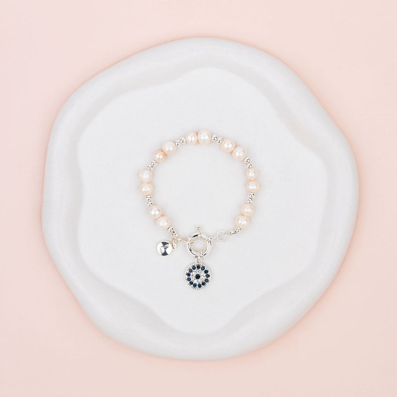 Silver Eye Pendant on Freshwater Pearl Bracelet